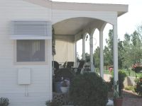 aluminum window awning and wood cover