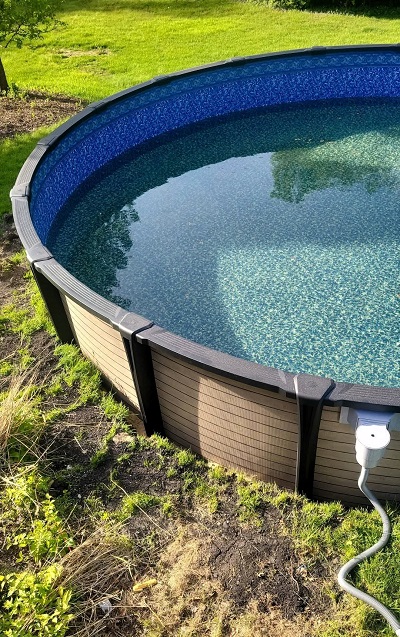  grass around an above ground swimming pool