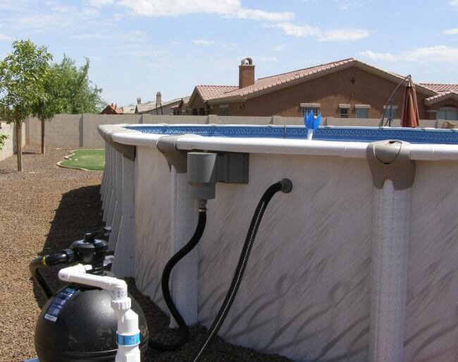desert landscaping around above ground pool