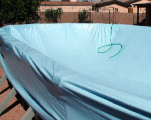 Doughboy liner stretched into an above ground pool