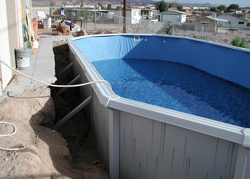 above ground pool in small hole
