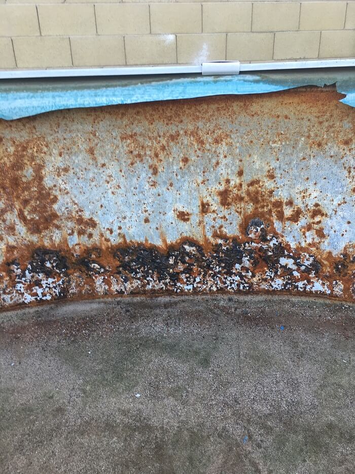 rusted pool wall on above ground pool