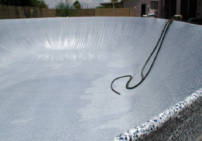beaded liner pulled over pool wall