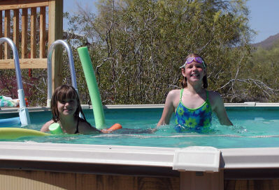 Kids Playing In Pool kids playing in an above ground pool