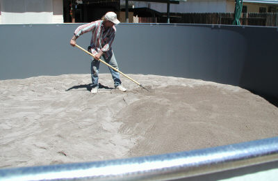 pool wall secured with metal rods