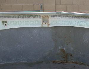 rusted pool skimmer